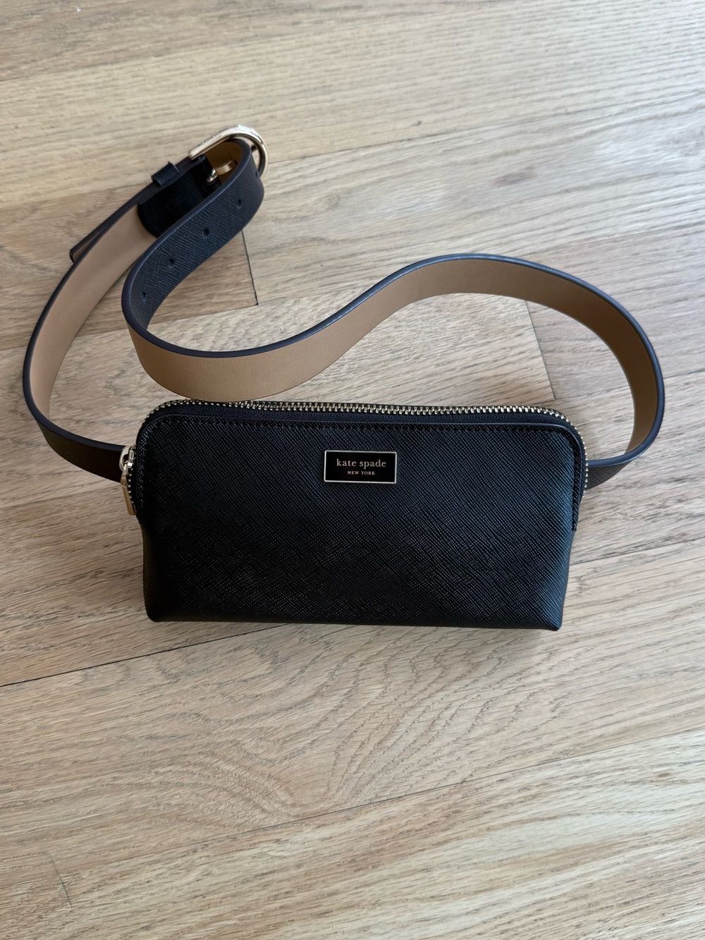 Kate Spade Logo Black Leather Crossbody Belt Bag with black strap.